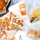 Taco Bell chalupa, tacos and sauces on wrappers